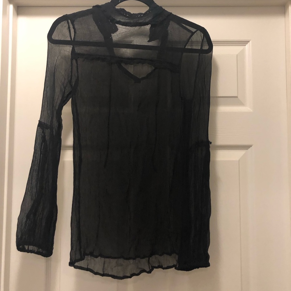 Free People sheer black turtleneck.